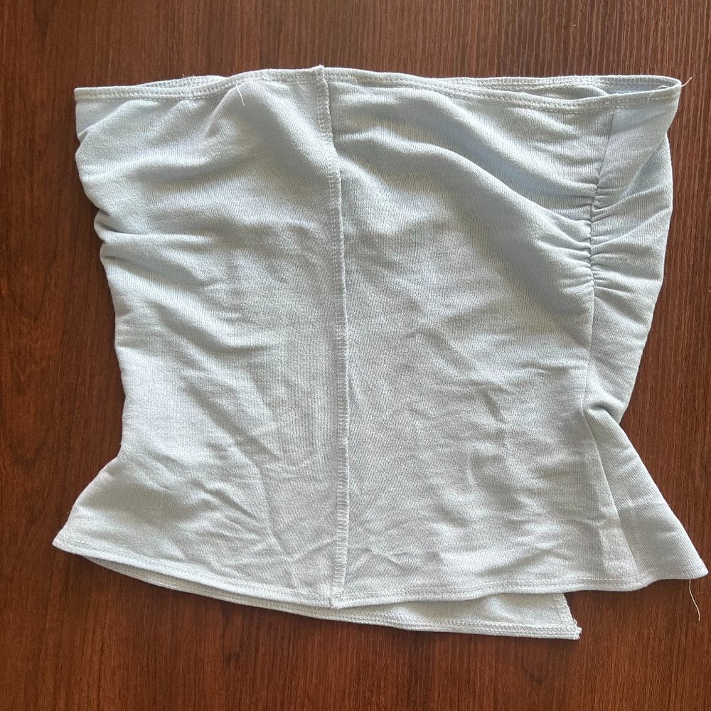Light blue strapless top with cut outs